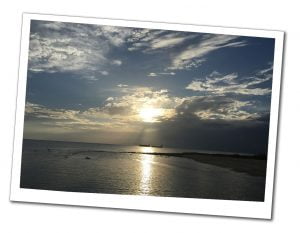 A picture of the late afternoon sunset over the sea on 7 mile beach, Grand Cayman 