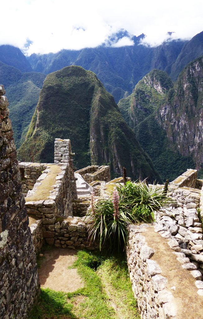 Outer walls of Inca buildings looking to the mountains, Machu Picchu