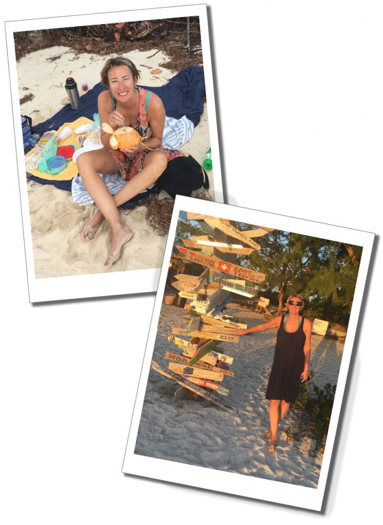 A woman on the beach drinking from a coconut