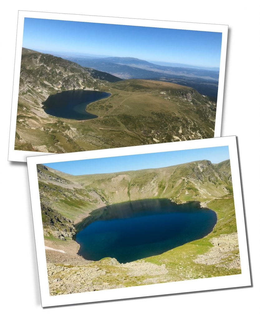 Rila Lakes, Bulgaria a view of 2 kidney shaped lakes high on a green hill on a cloudless sunny day