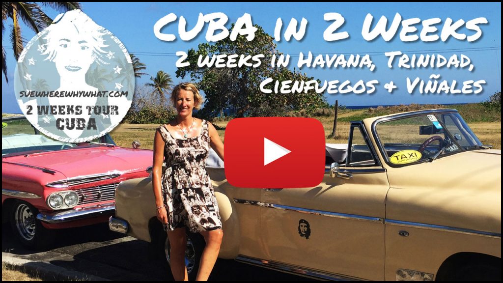A blonde woman in summer dress standing by a custard coloured 1950s vintage car with white text overlay and red youtube button in Havana, Cuba