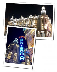 Hotel Ingleterra lit up at night with large blue neon lights in Havana Cuba