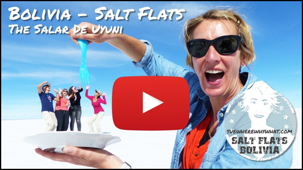 A blonde woman in sunglasses laughing holding a blue fork over a plate with four people who as part of an optical illusion are pretending to be scared with a white text overlay and red youtube button
