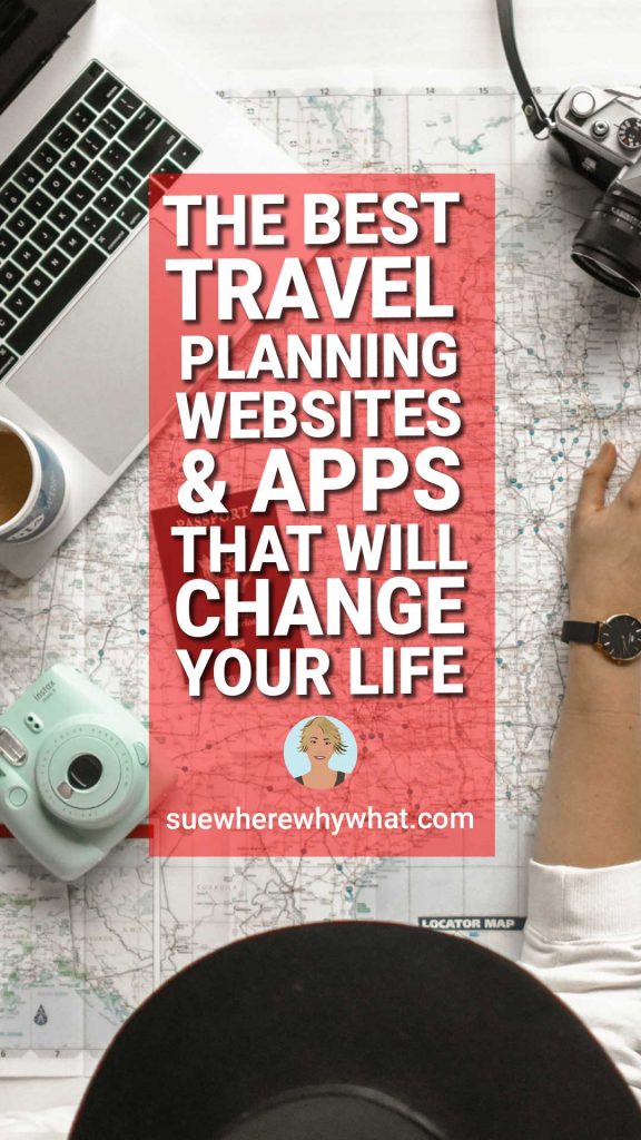 An arial view of a woman looking at a map with a laptop, camera and cup of a coffee