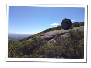 A Large boulder high on a mountain top in Australian countryside Solo Road Trip Essentials – Top Tips for Hitting the Road Alone