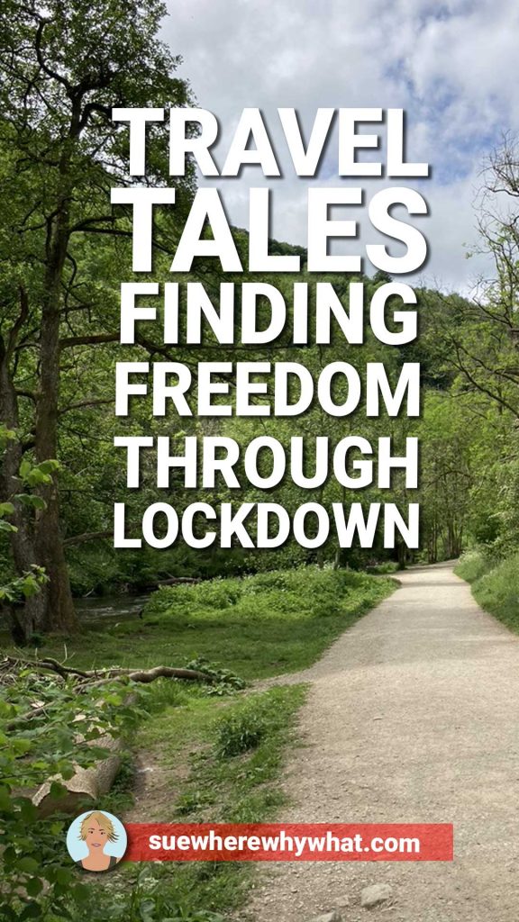 A long flinty path winding through a tree lined valley