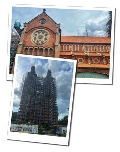 Views of Notre Dam church in Saigon, one part red brick the other in scaffolding