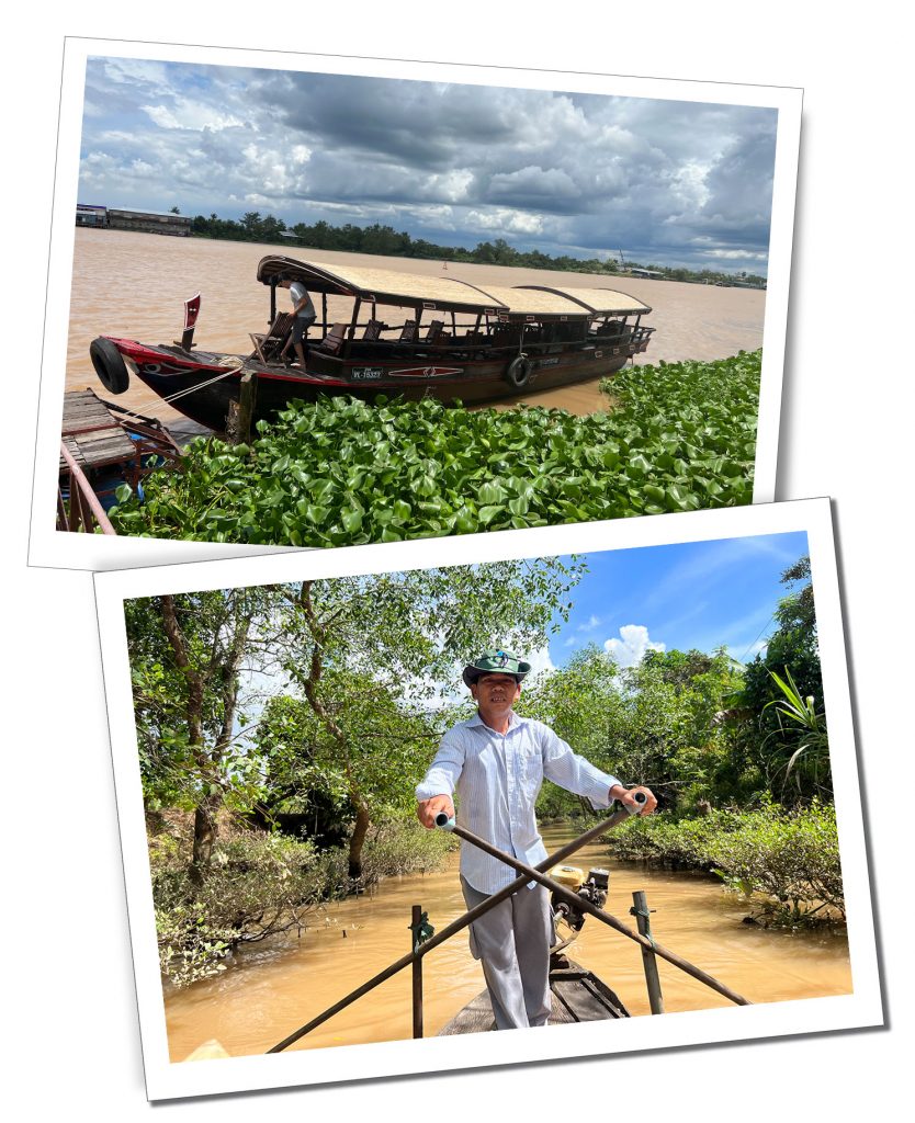 A boat and a man Vietnamese man in a hat rowing on the Mekong river