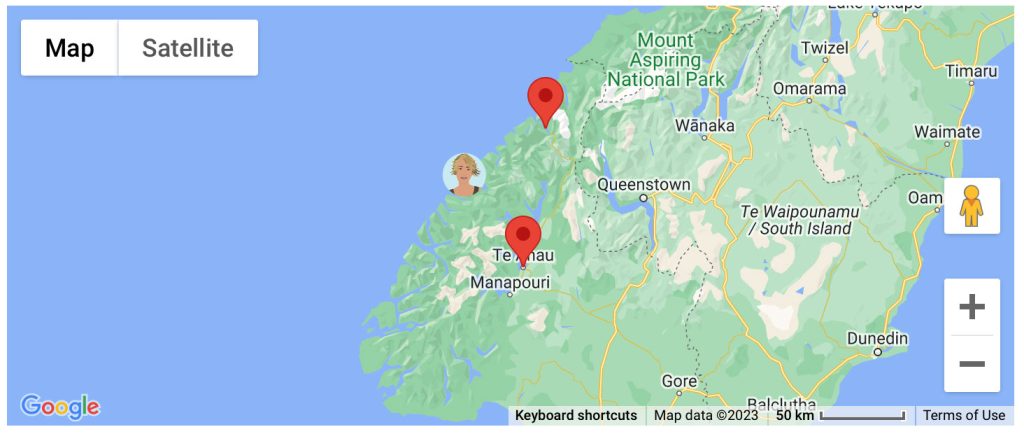 A map of New Zealand with an avatar of blonde woman stuck near the word Queenstown